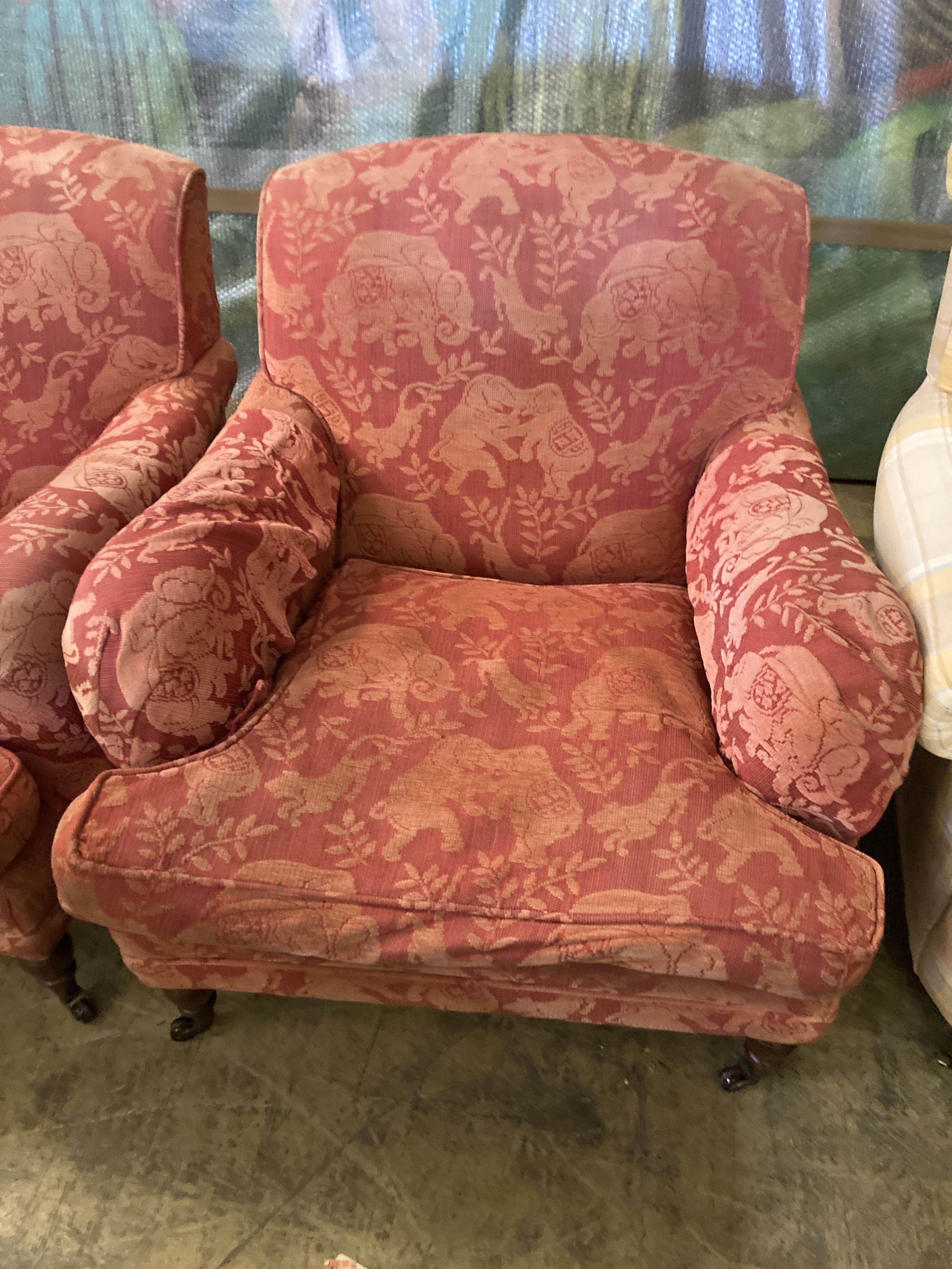 A pair of late Victorian style upholstered lounge armchairs, width 88cm, depth 98cm, height 83cm